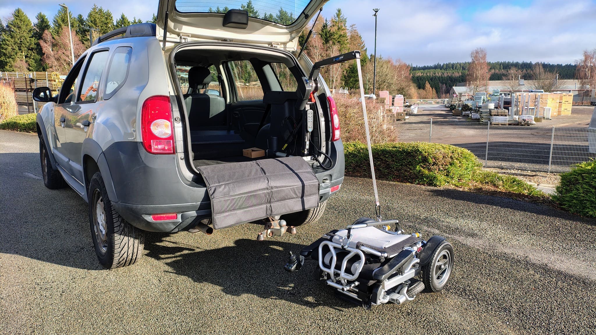 Dacia Duster - Chaise roulante